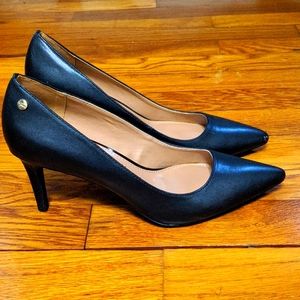Black Calvin Klein pumps